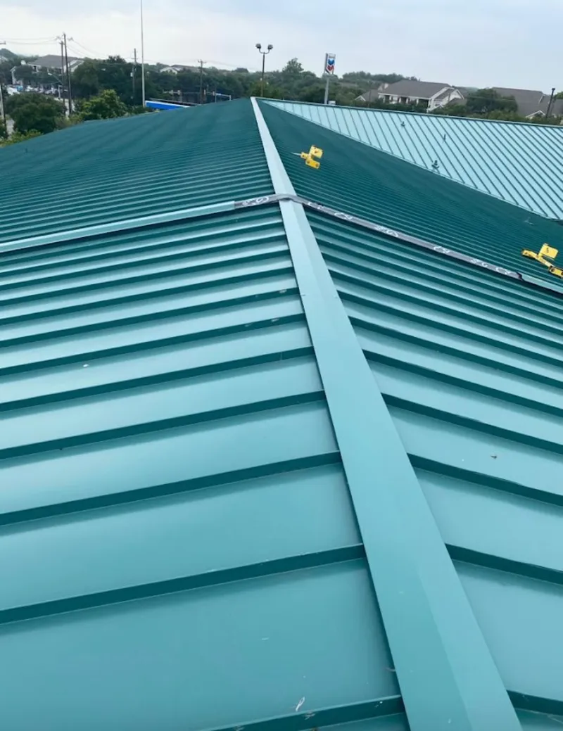 Green commercial metal roof ridge and valley for Metal Roof Repair in Alexandria